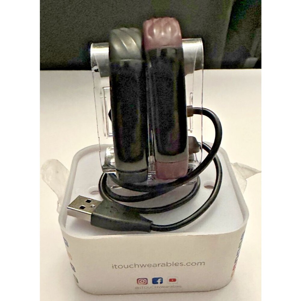 Two itouch slim fitness trackers and 2 chargers (not tested)